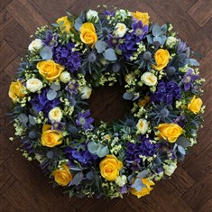 Vibrant Blue &amp; Yellow Funeral Wreath